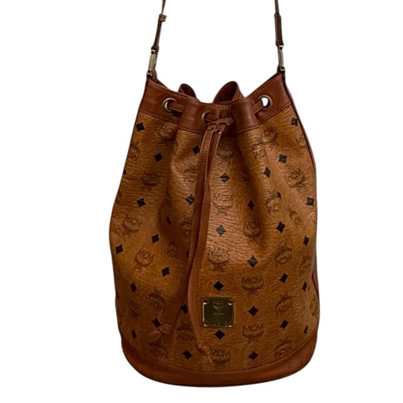 MCM Handbags - MCM München Cognac Visetos Drawstring Bucket Bag Vintage Leather Trim Crossbody